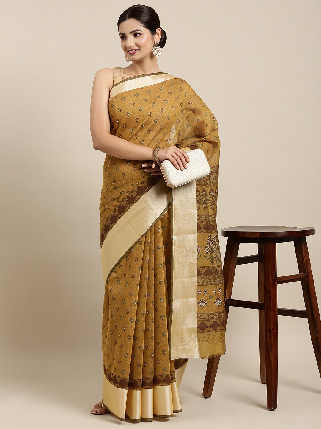 

The Chennai Silks Mustard Floral Zari Pure Cotton Saree