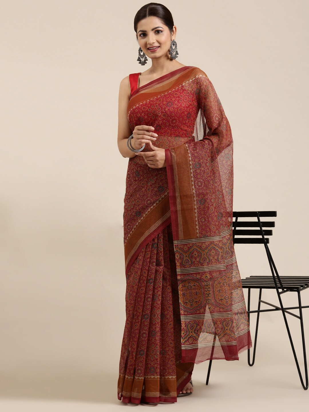 

The Chennai Silks Maroon & Green Floral Zari Supernet Kota Saree