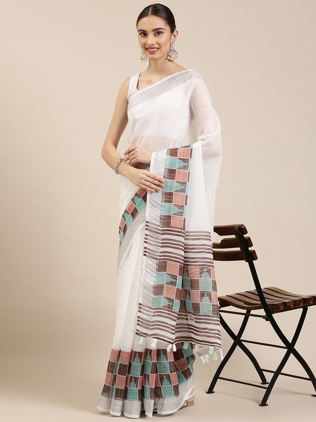 

The Chennai Silks Off White & Brown Zari Linen Blend Saree