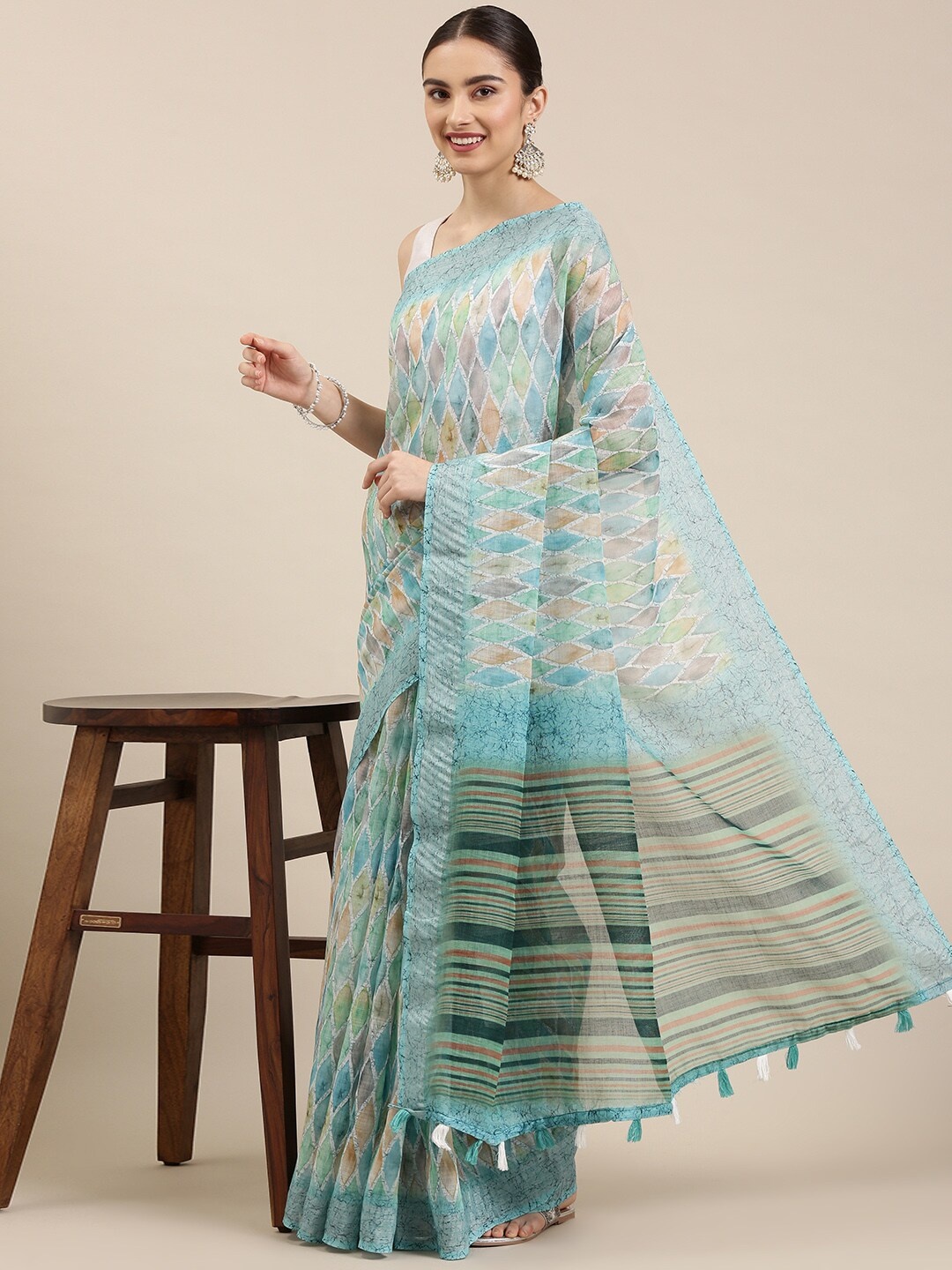 

The Chennai Silks Green Linen Blend Saree