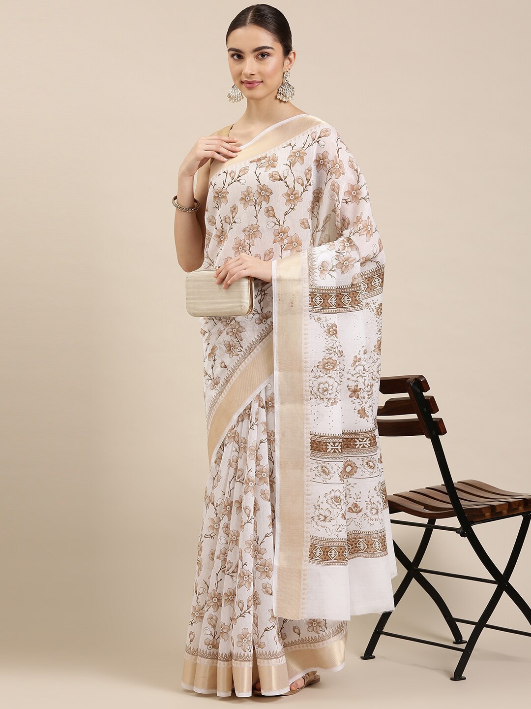 

The Chennai Silks White & Brown Floral Zari Pure Cotton Saree