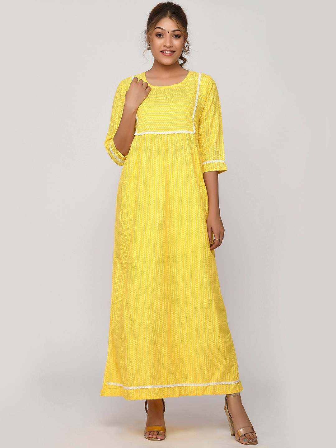 

Kesarya Women Yellow Kurta with Palazzos