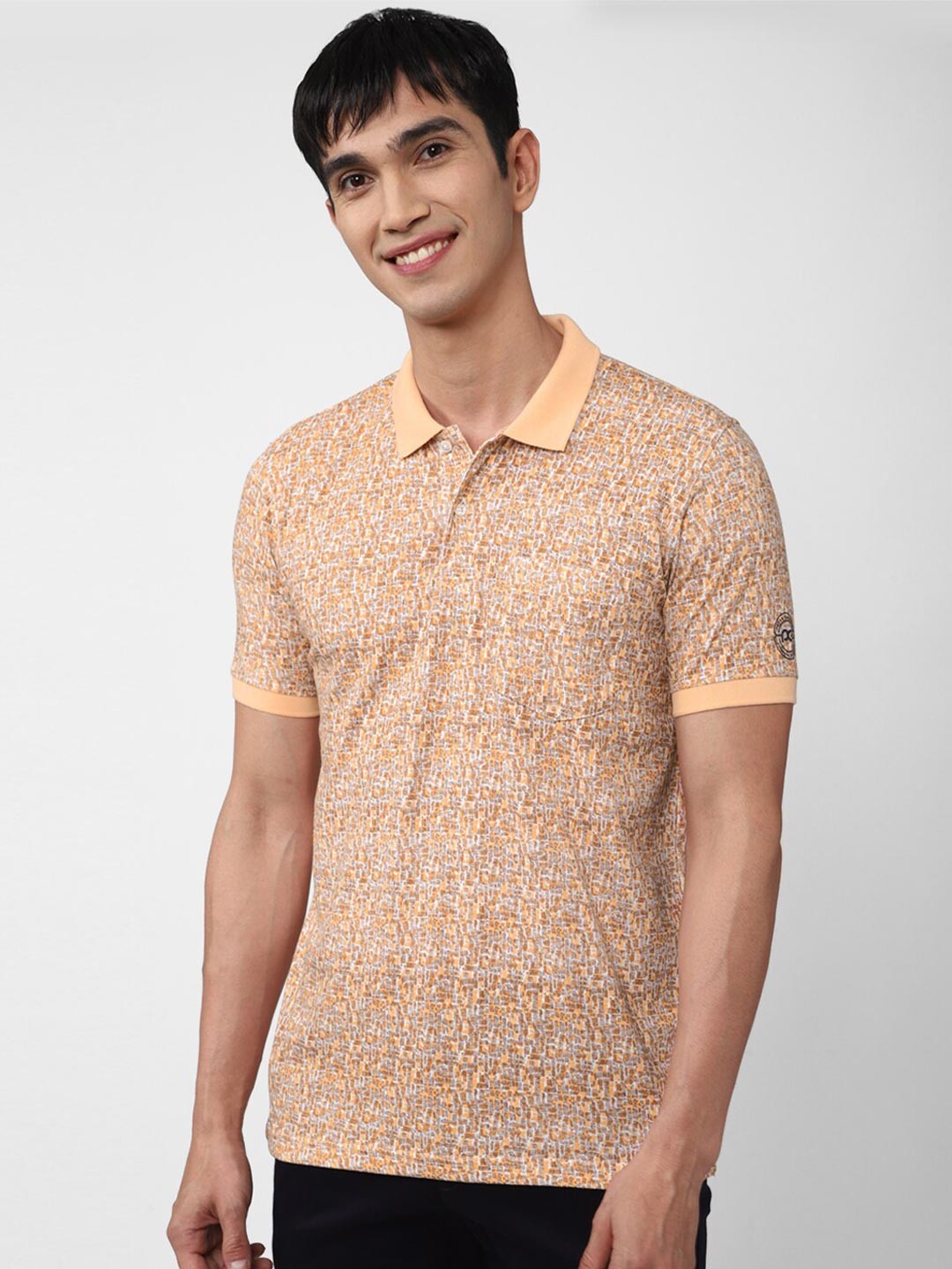 

Peter England Casuals Men Peach-Coloured Printed Polo Collar T-shirt
