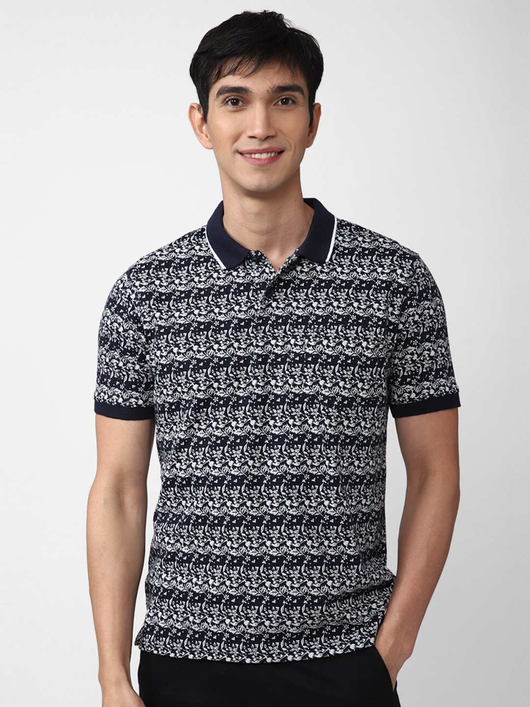

Peter England Casuals Men Grey Floral Printed Polo Collar T-shirt