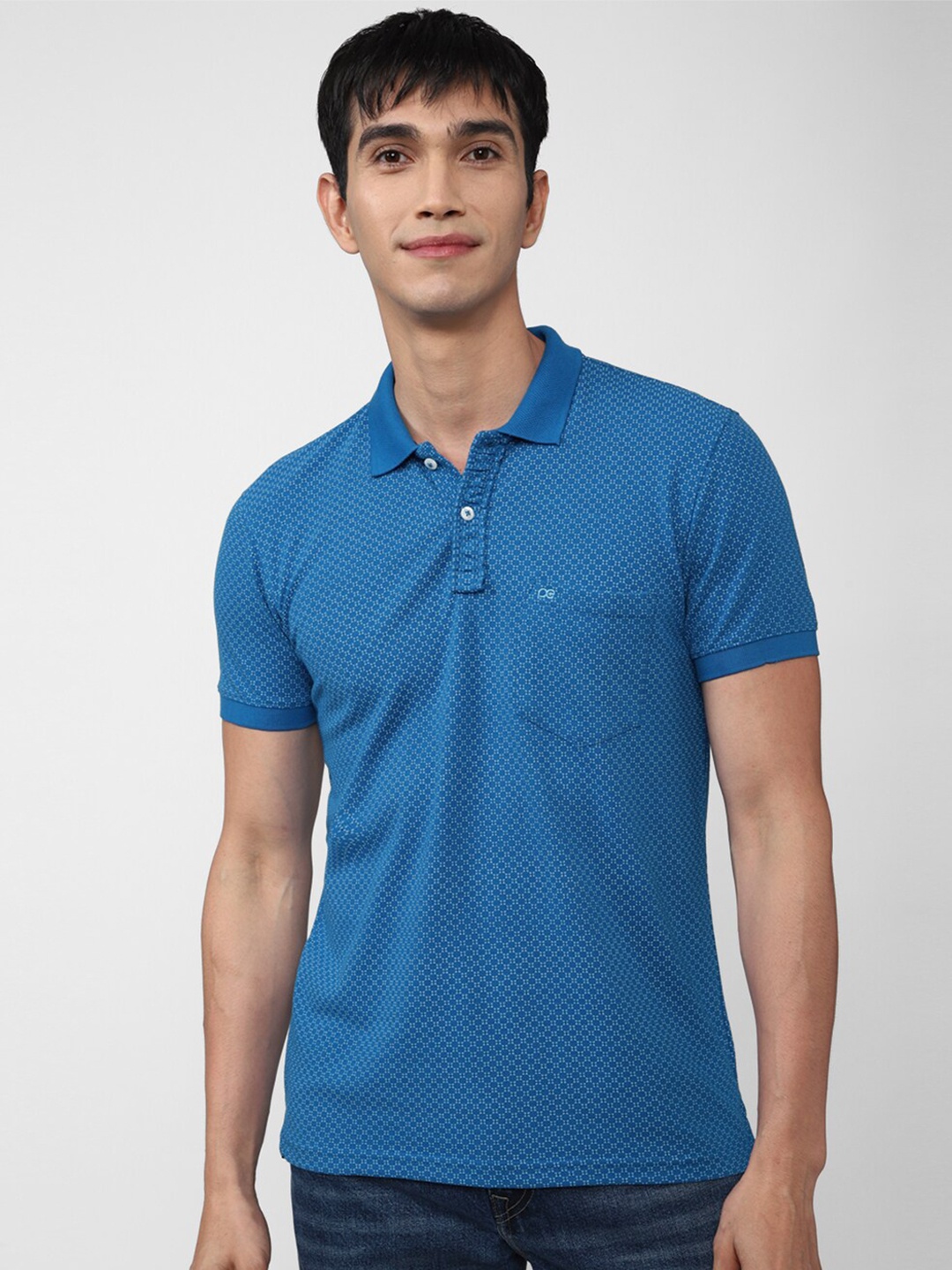 

Peter England Casuals Men Blue Solid Polo Collar Slim Fit T-shirt