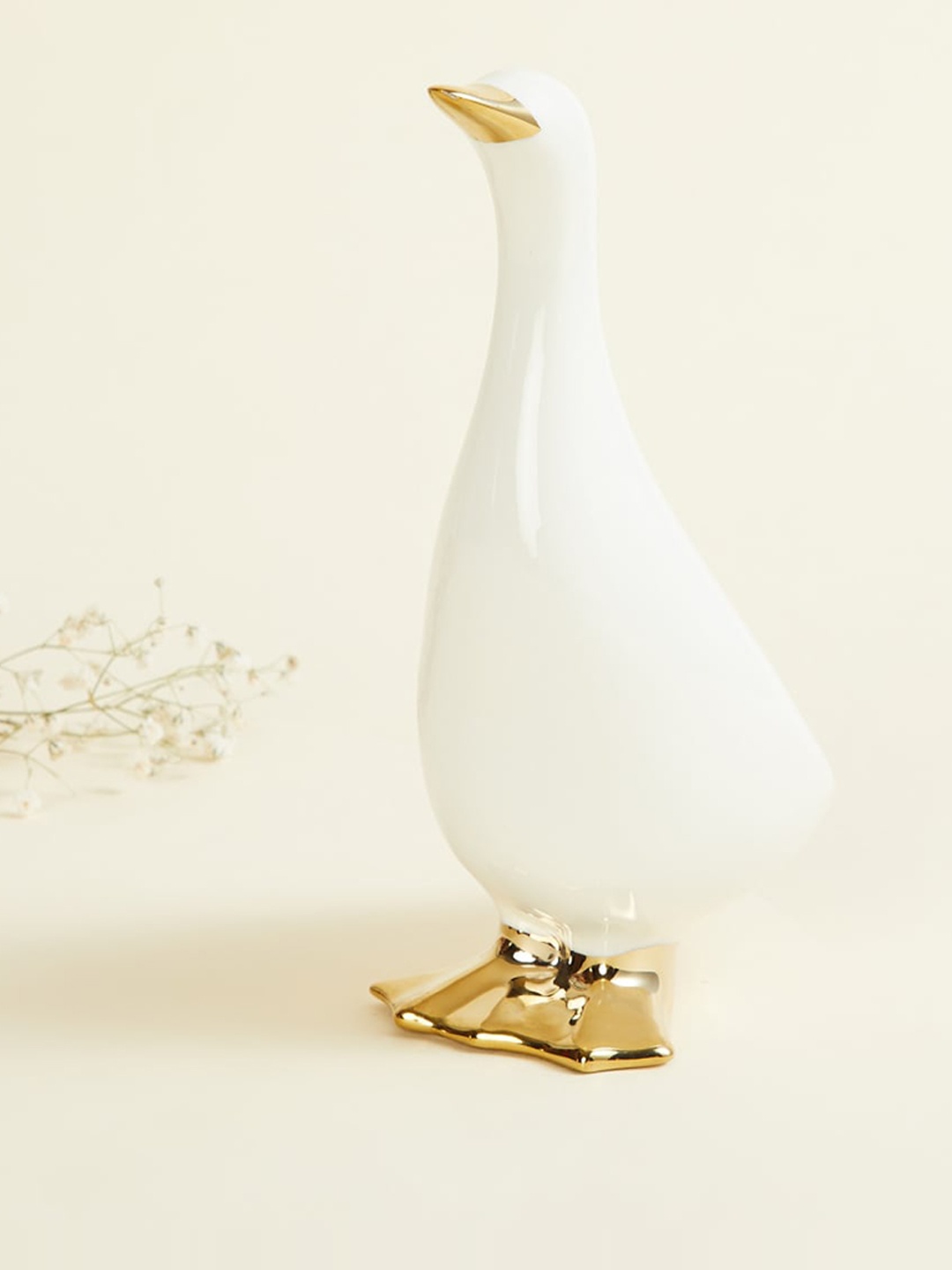 

Home Centre White & Gold Solid Ceramic Decorative Duck Figurine