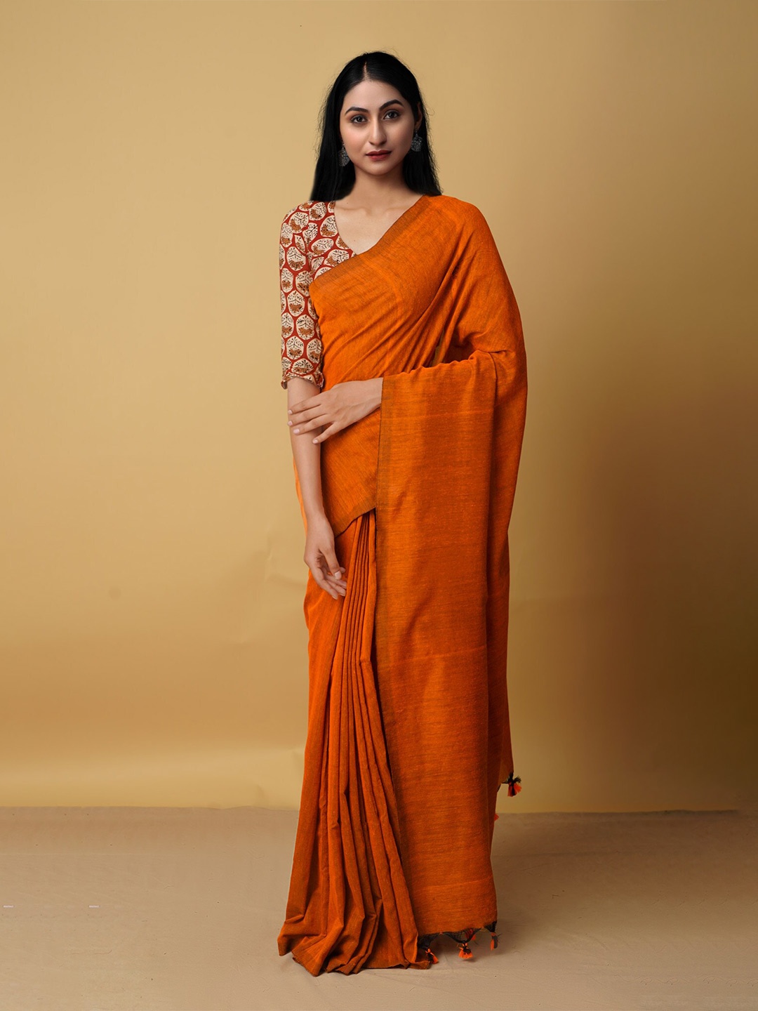 

Unnati Silks Orange Woven Design Zari Pure Linen Jamdani Saree