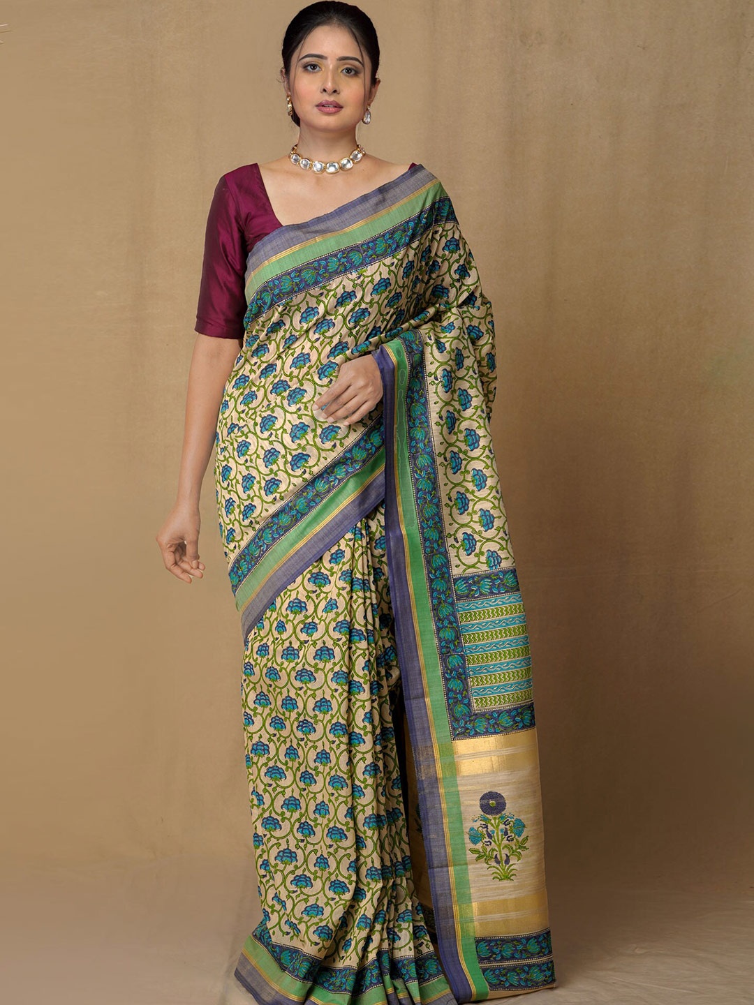 

Unnati Silks Brown & Blue Floral Zari Silk Blend Tussar Saree