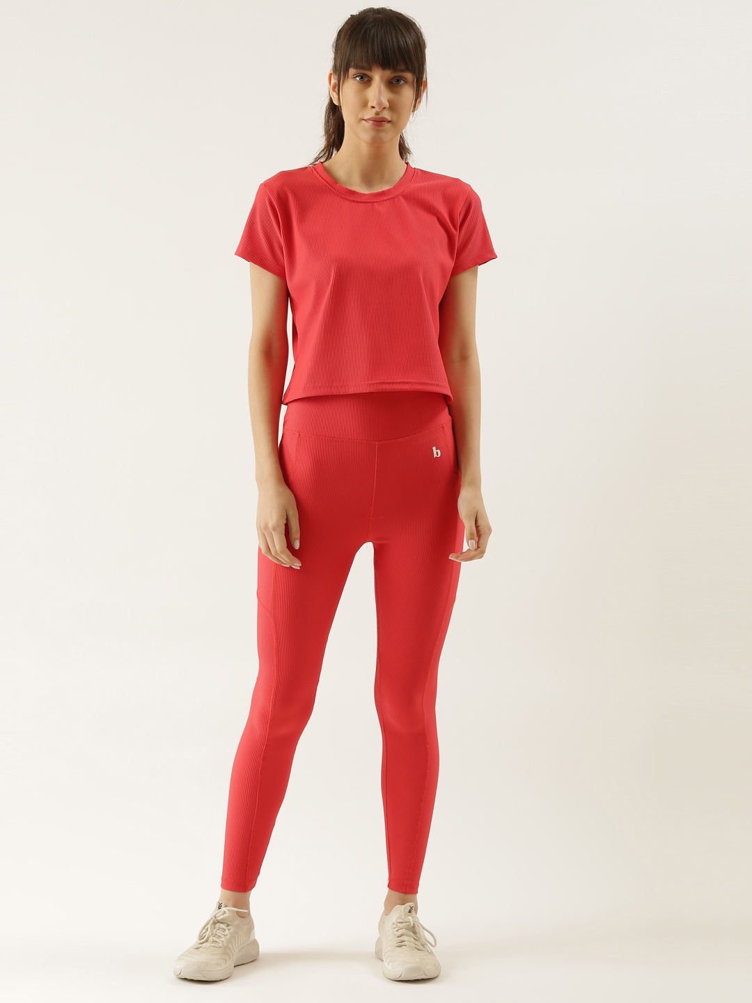 

Bannos Swagger Women Peach-Colored Rapid-Dry Solid Crop Top & Tights
