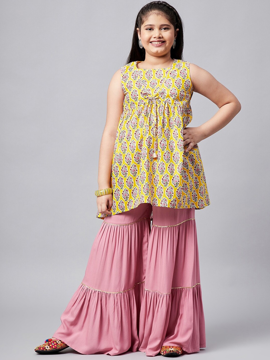 

Stylo Bug Girls Yellow Ethnic Motifs Printed Pleated Pure Cotton Kurti with Sharara