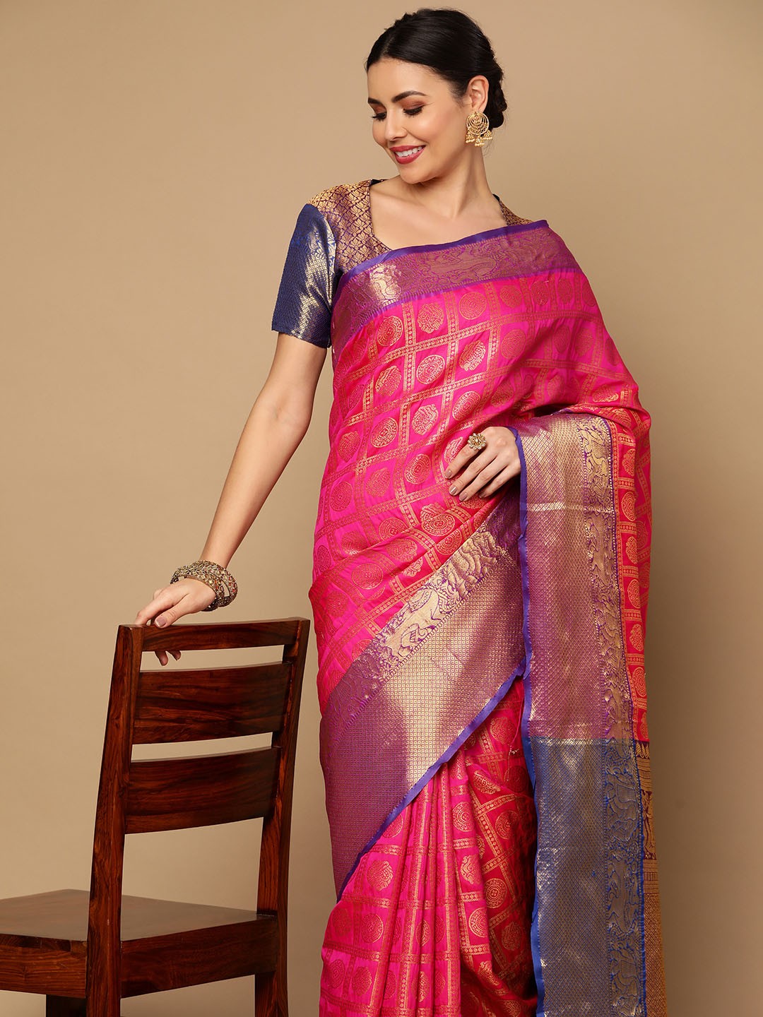 

Satrani Pink & Purple Ethnic Motifs Zari Banarasi Saree