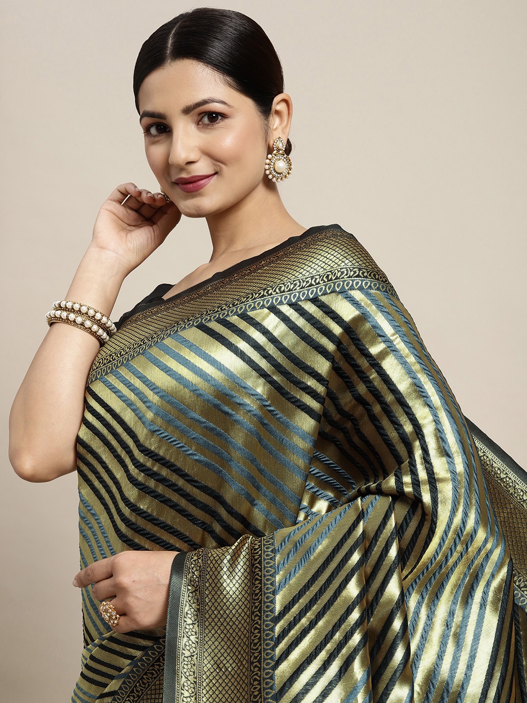 

Saree mall Grey & Black Striped Zari Silk Blend Kanjeevaram Sarees