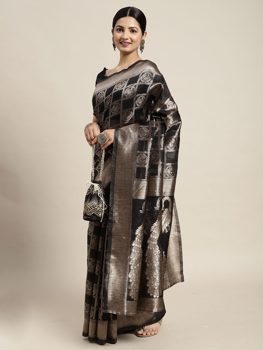 

Saree mall Black & Golden Woven Design Patola Saree