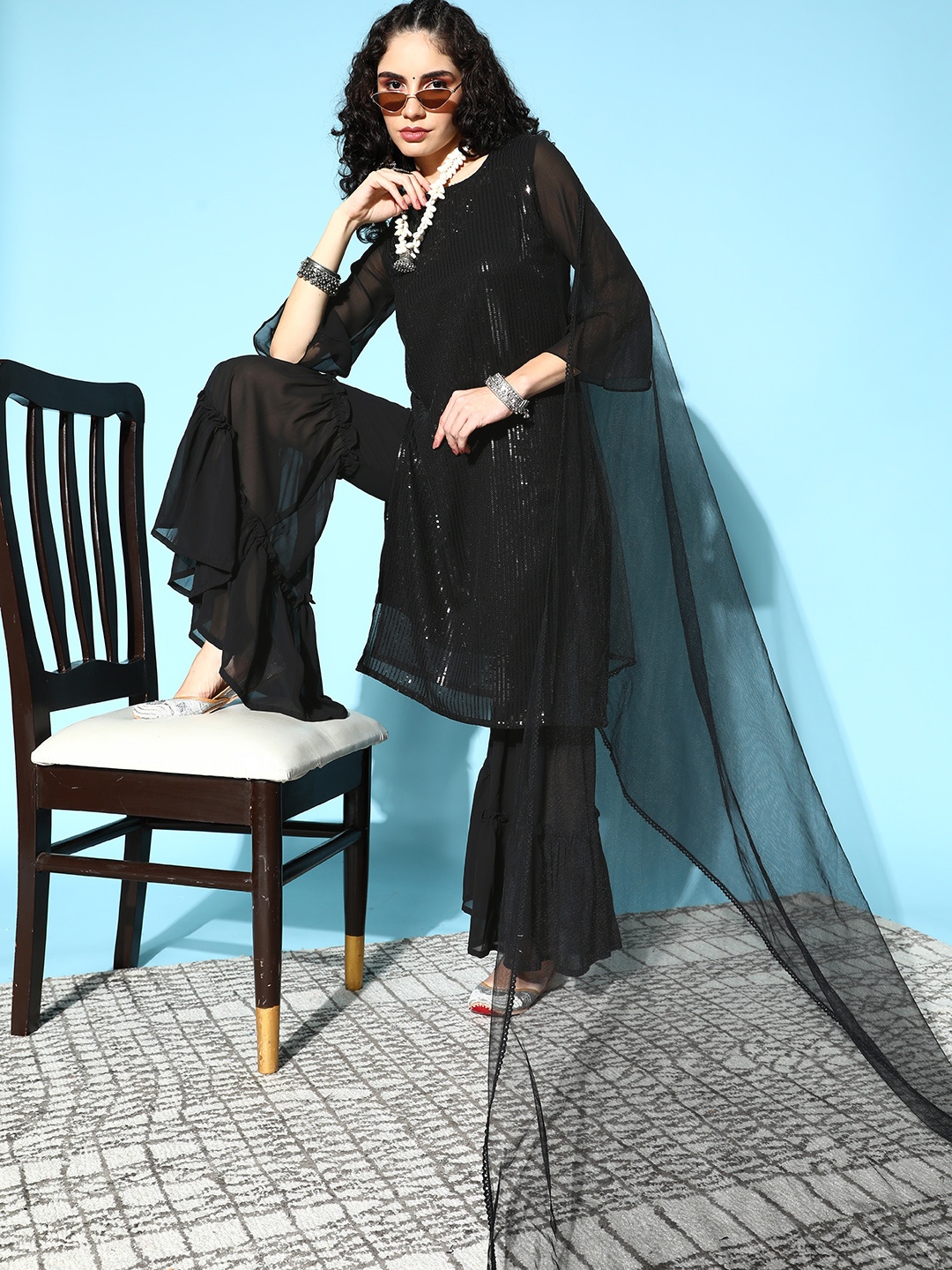 

Tikhi Imli Women Black Sequinned Kurta with Sharara & Dupatta