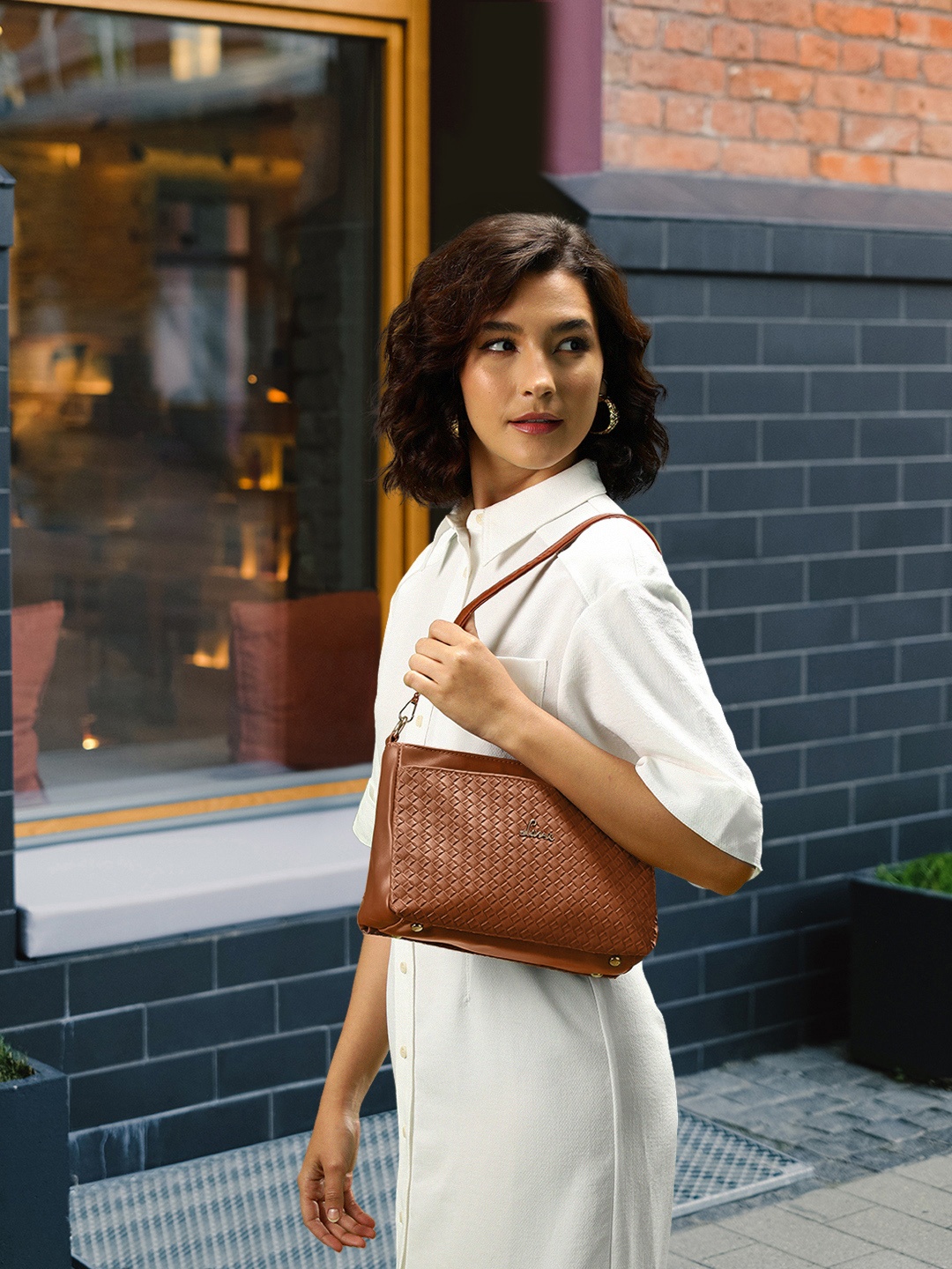 

Lavie Brown Textured Bot Olivia Structured Sling Bag