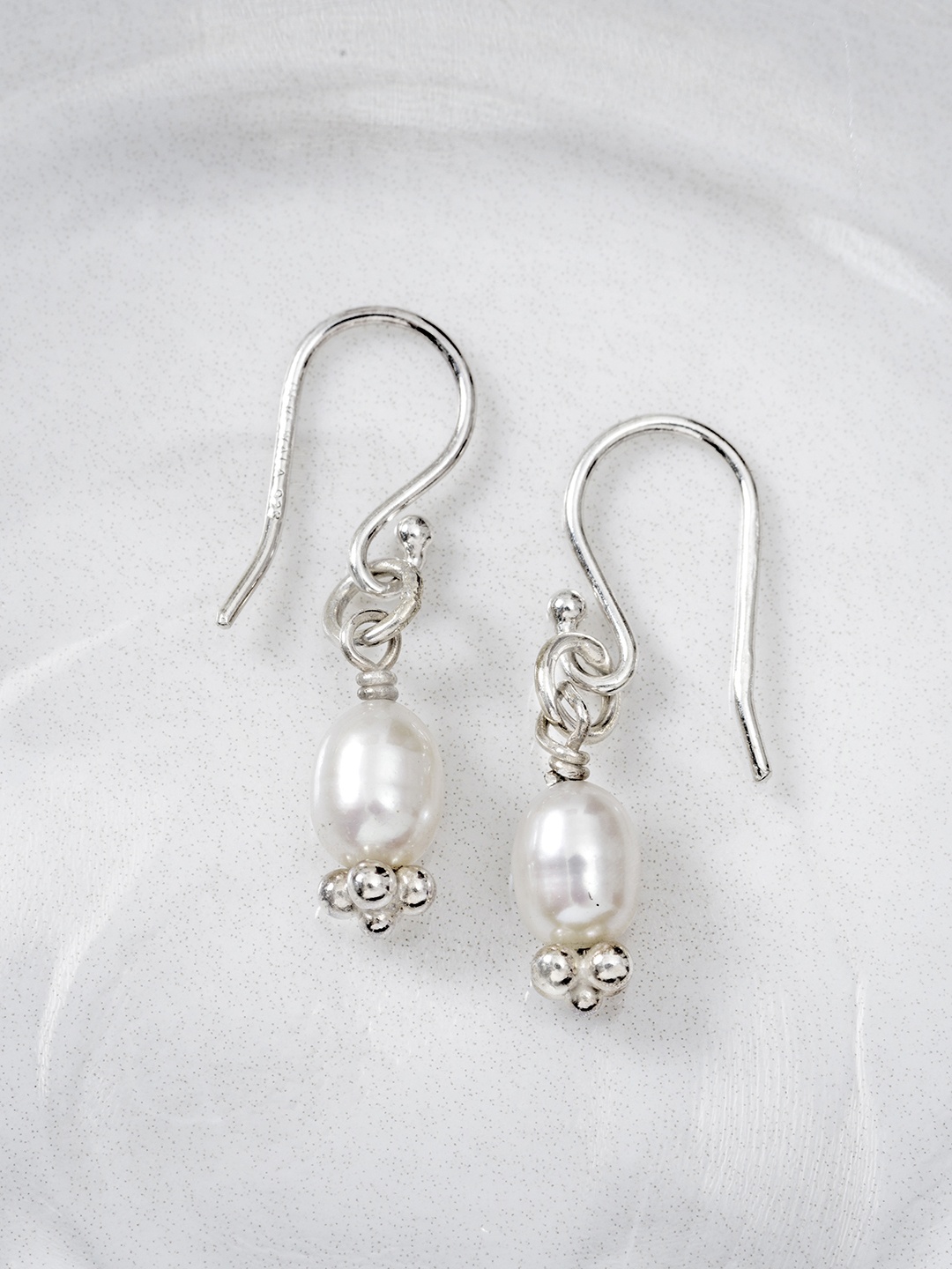 

Zavya White Teardrop Shaped Drop Earrings