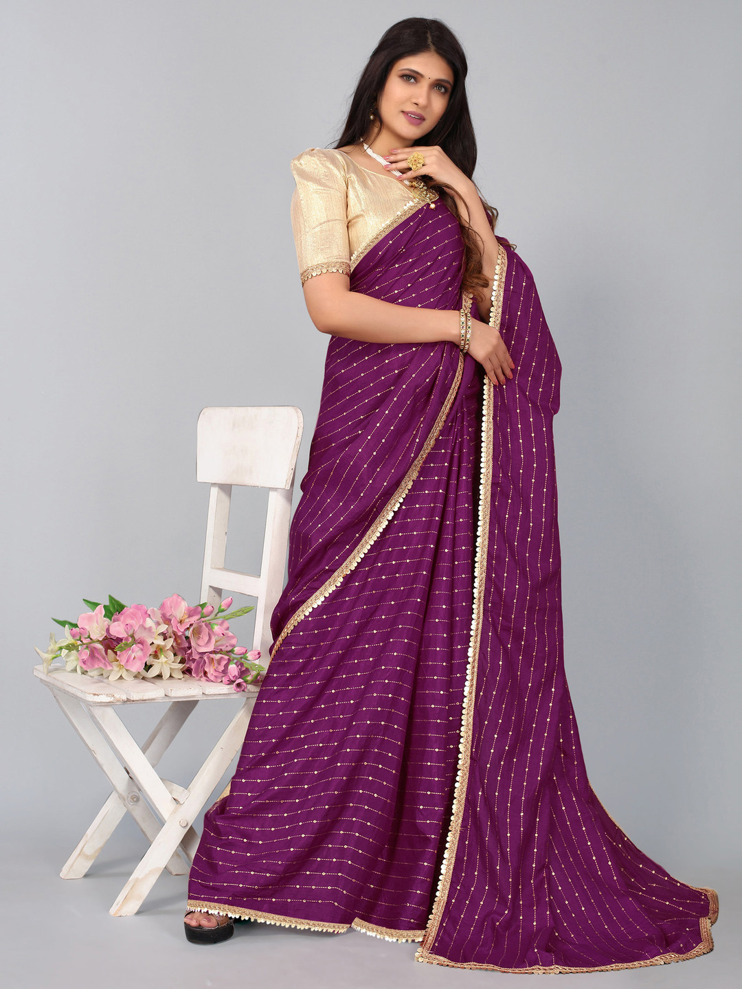 

Satrani Purple & Gold-Toned Embellished Saree