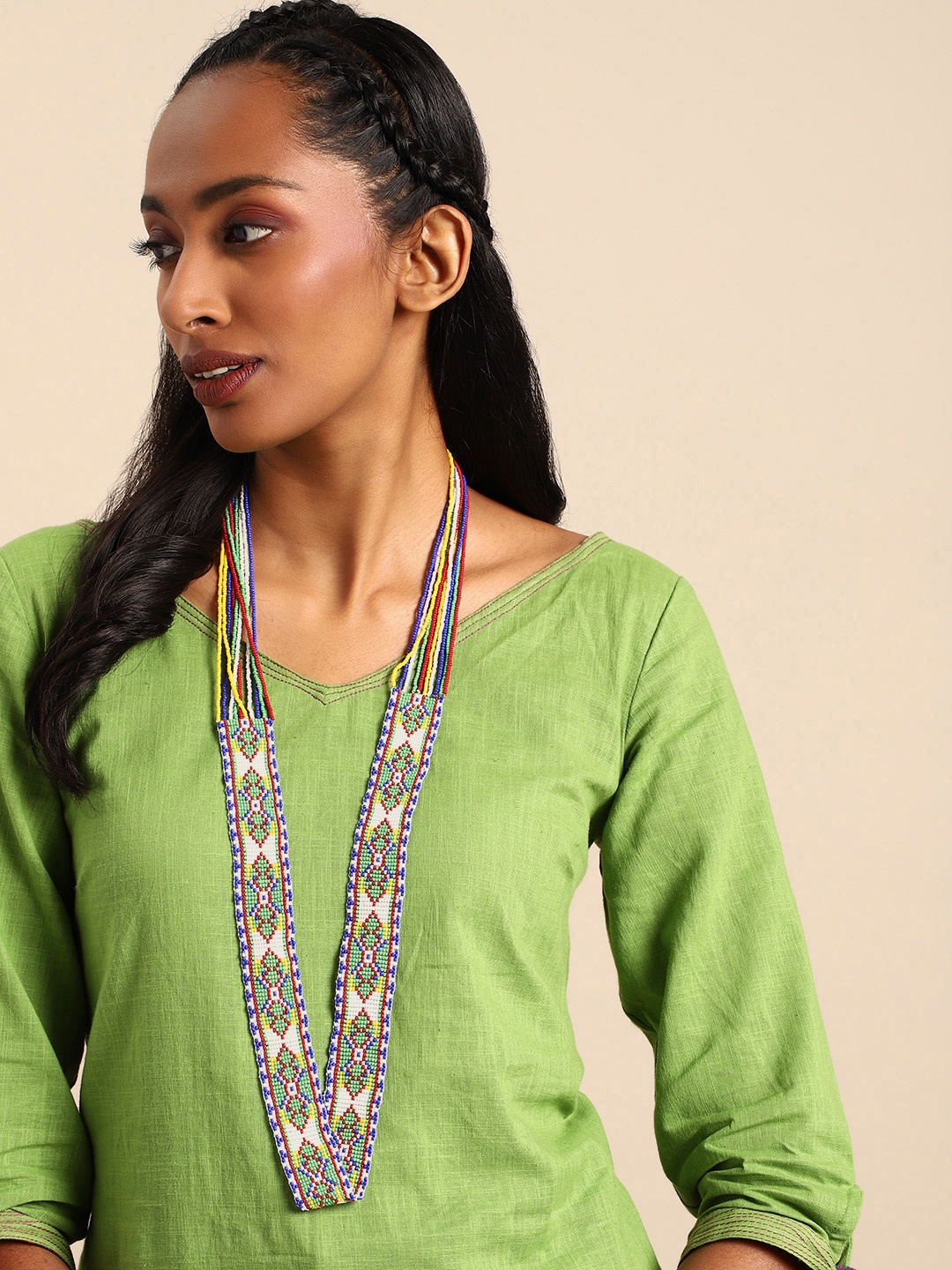 

Taavi Women Artificial Beads Studded Statement Tribal Necklace, White