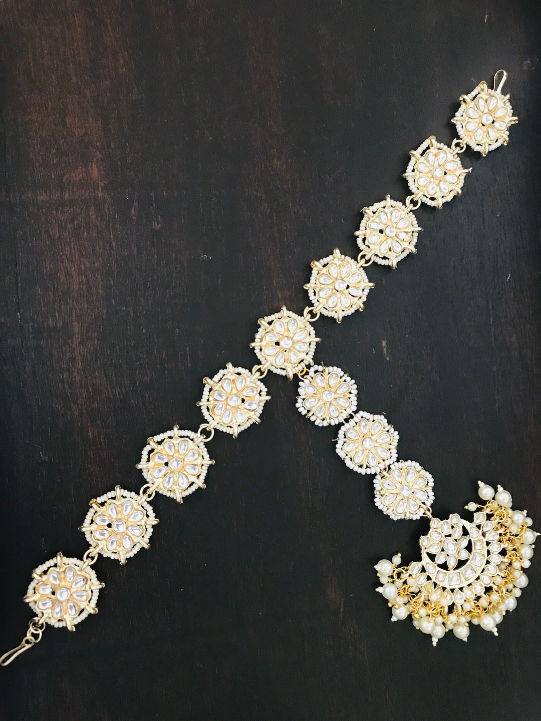 

The Opal Factory Gold-Plated White Stone Studded Sheeshphool Tikka