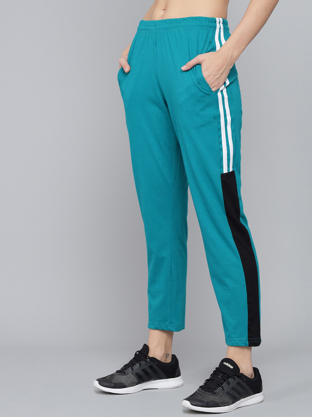 

Q-rious Women Green Solid Pure Cotton Track Pants