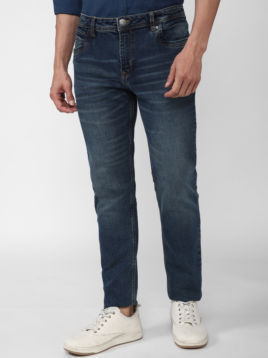 

Peter England Casuals Men Navy Blue Heavy Fade Jeans