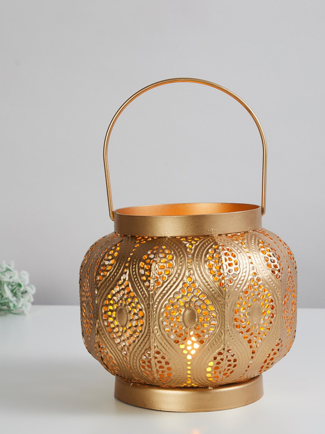 

Home Centre Gold-Toned Patterned Iron Lantern
