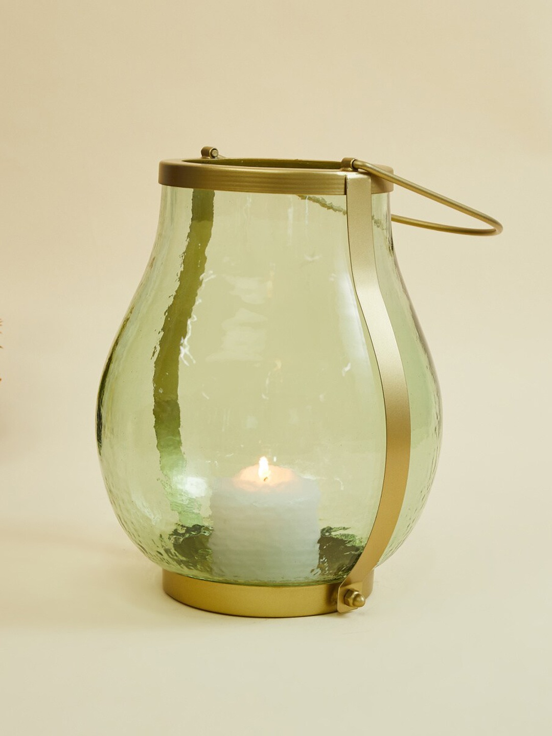 

Home Centre Transparent & Gold-Toned Fiesta Textured Glass Abstract Hanging Lantern