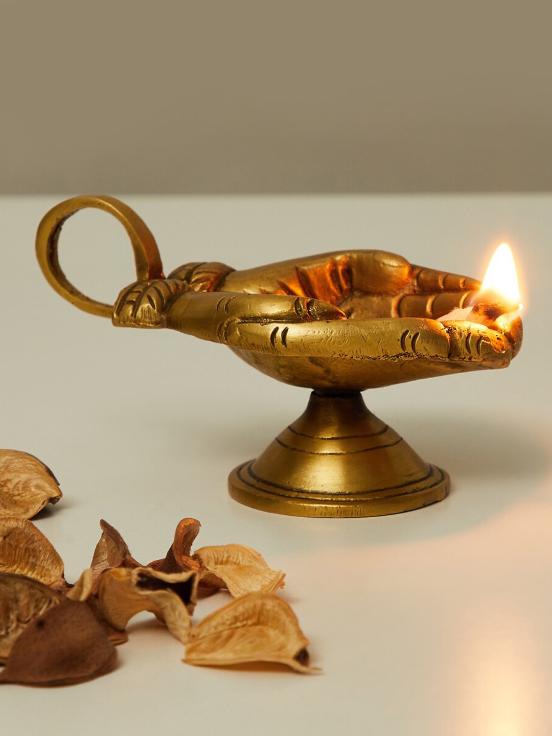 

Home Centre Gold-Toned Corsica Mystic India Textured Hand Brass Diya