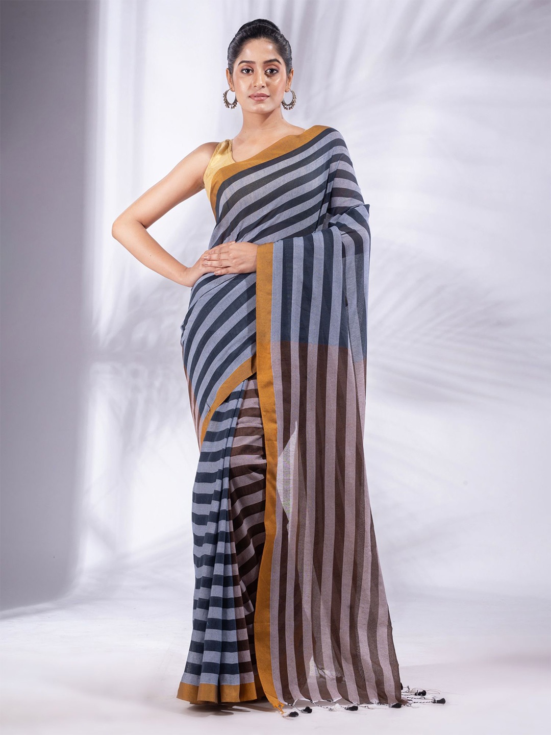 

Charukriti Black & Brown Striped Pure Cotton Saree