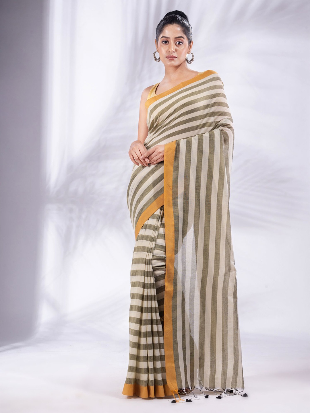 

Charukriti Women Off White & Green Striped Pure Cotton Saree