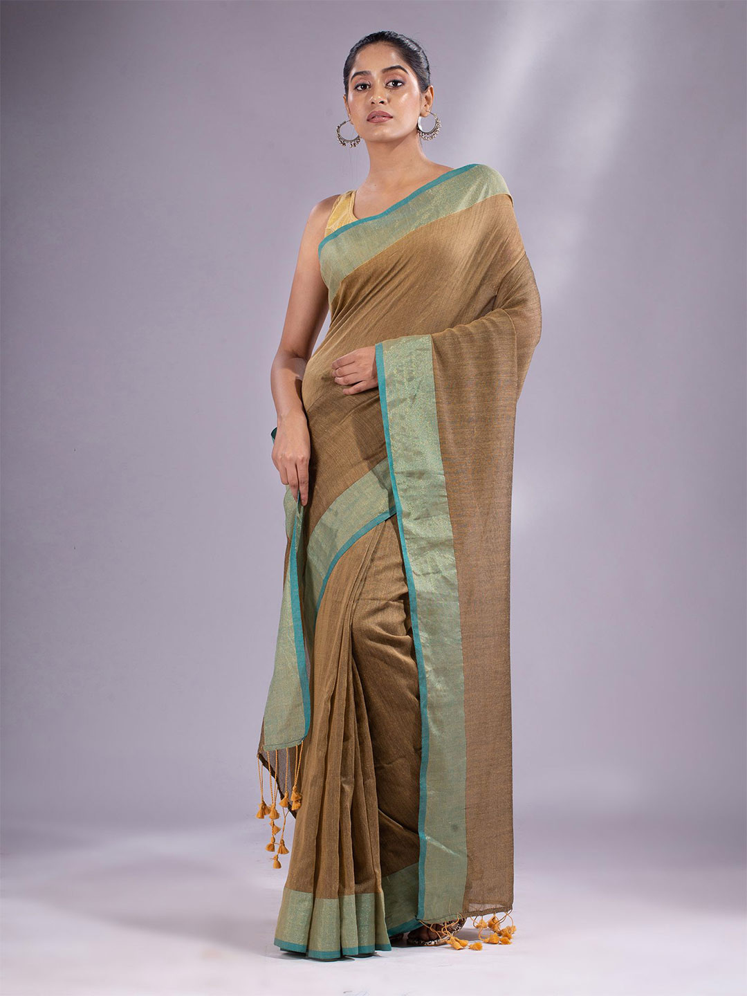 

Charukriti Beige & Blue Woven Design Zari Pure Cotton Saree