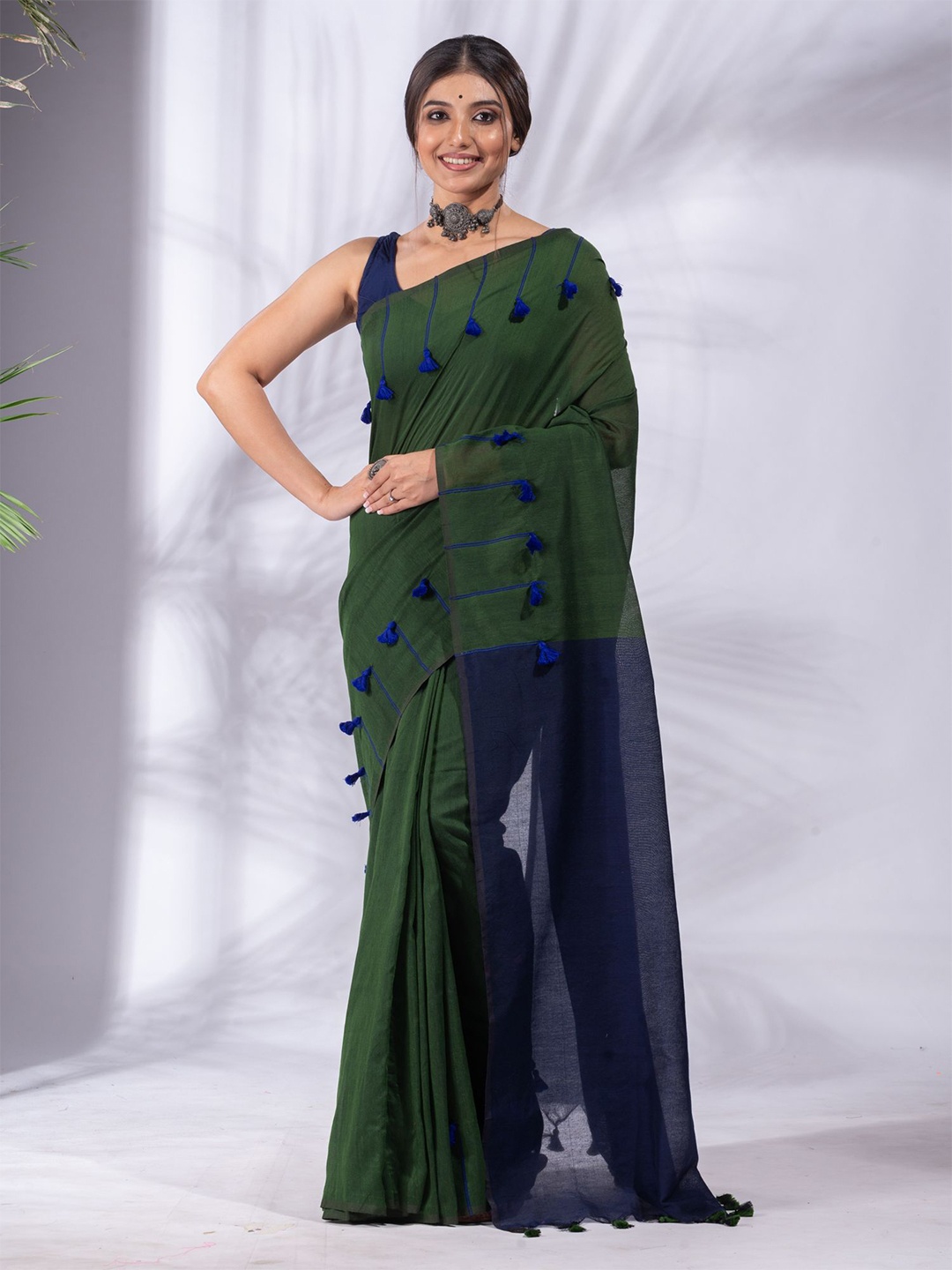 

Charukriti Green & Navy Blue Pure Cotton Saree