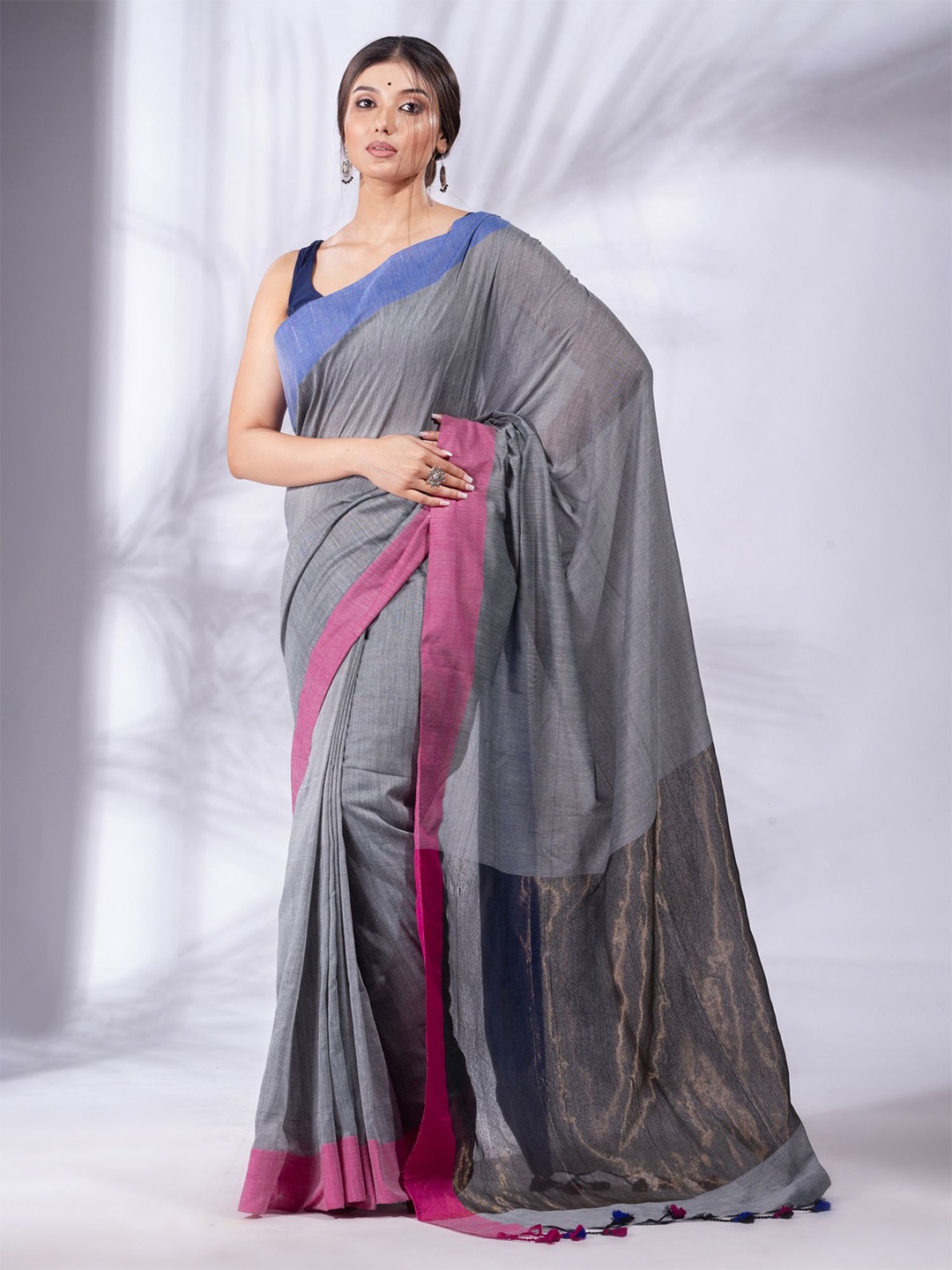 

Charukriti Grey & Blue Solid Pure Cotton Saree