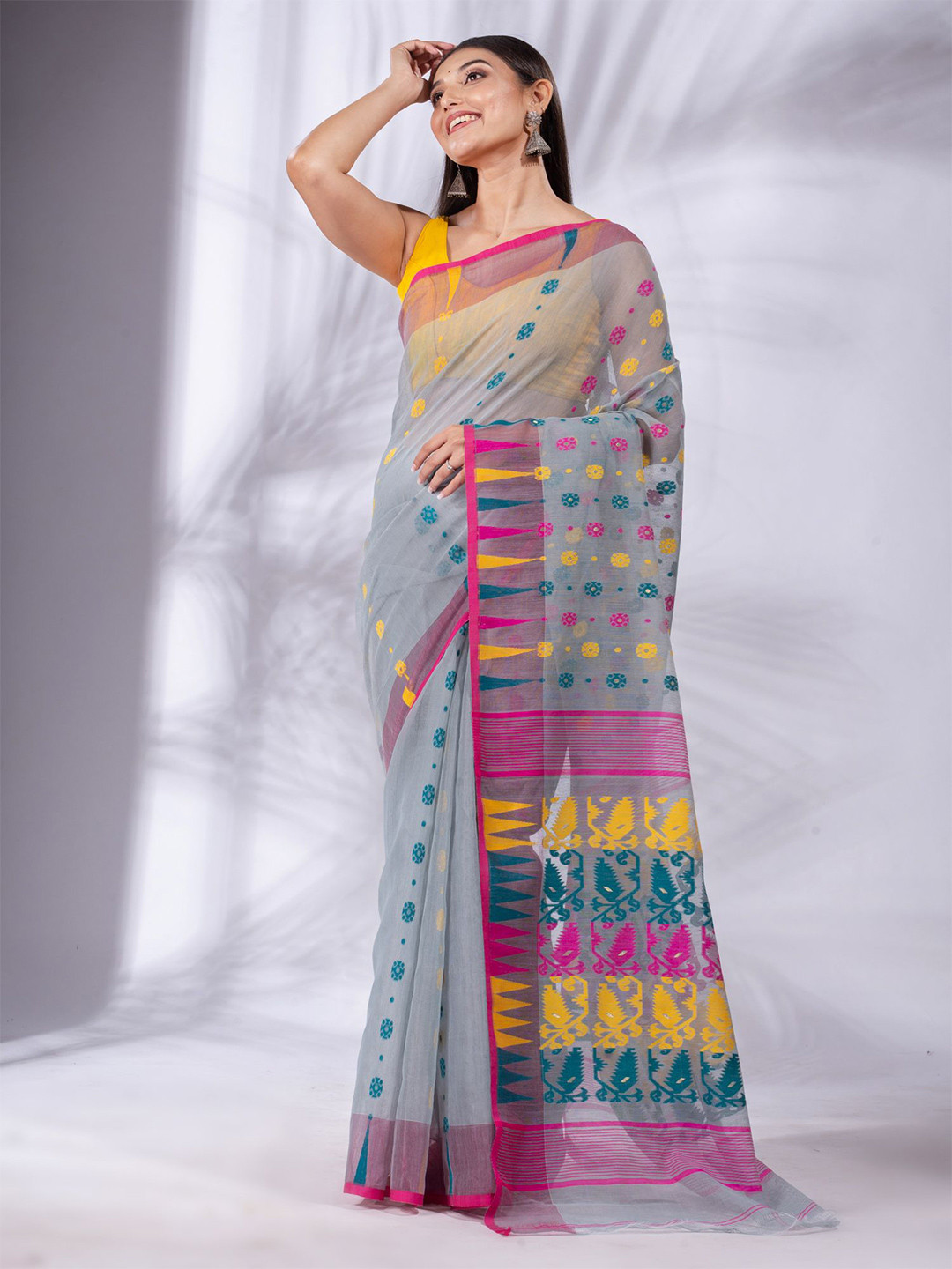 

Charukriti Grey & Yellow Floral Silk Cotton Jamdani Saree