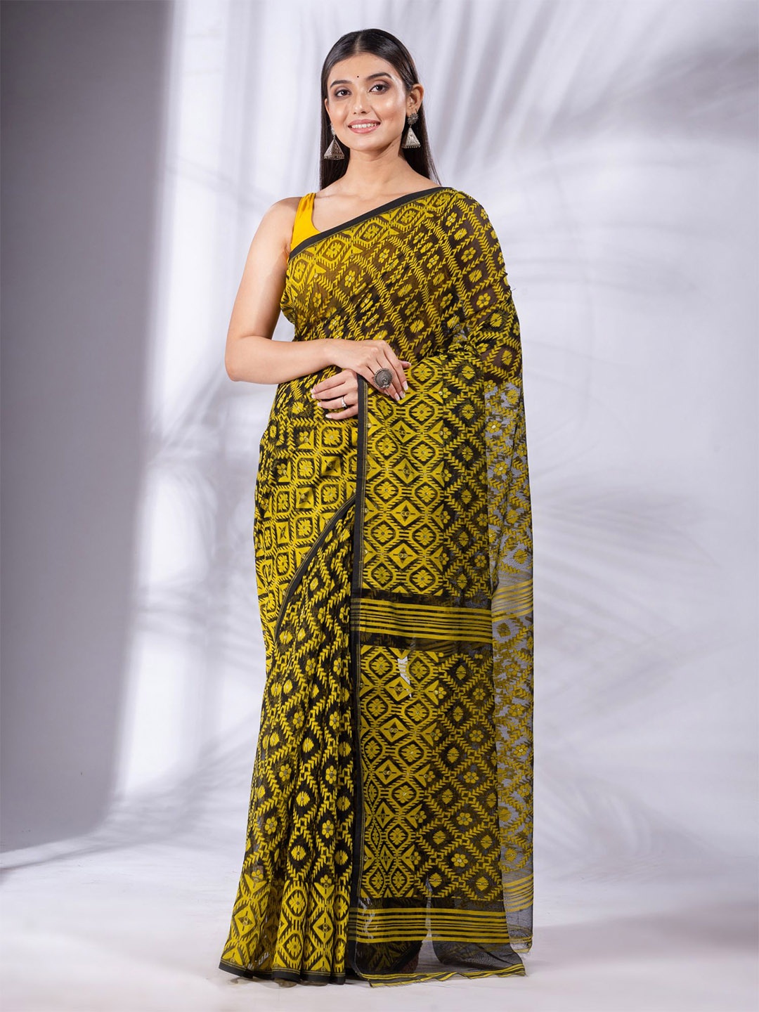 

Charukriti Black & Yellow Floral Silk Cotton Jamdani Saree