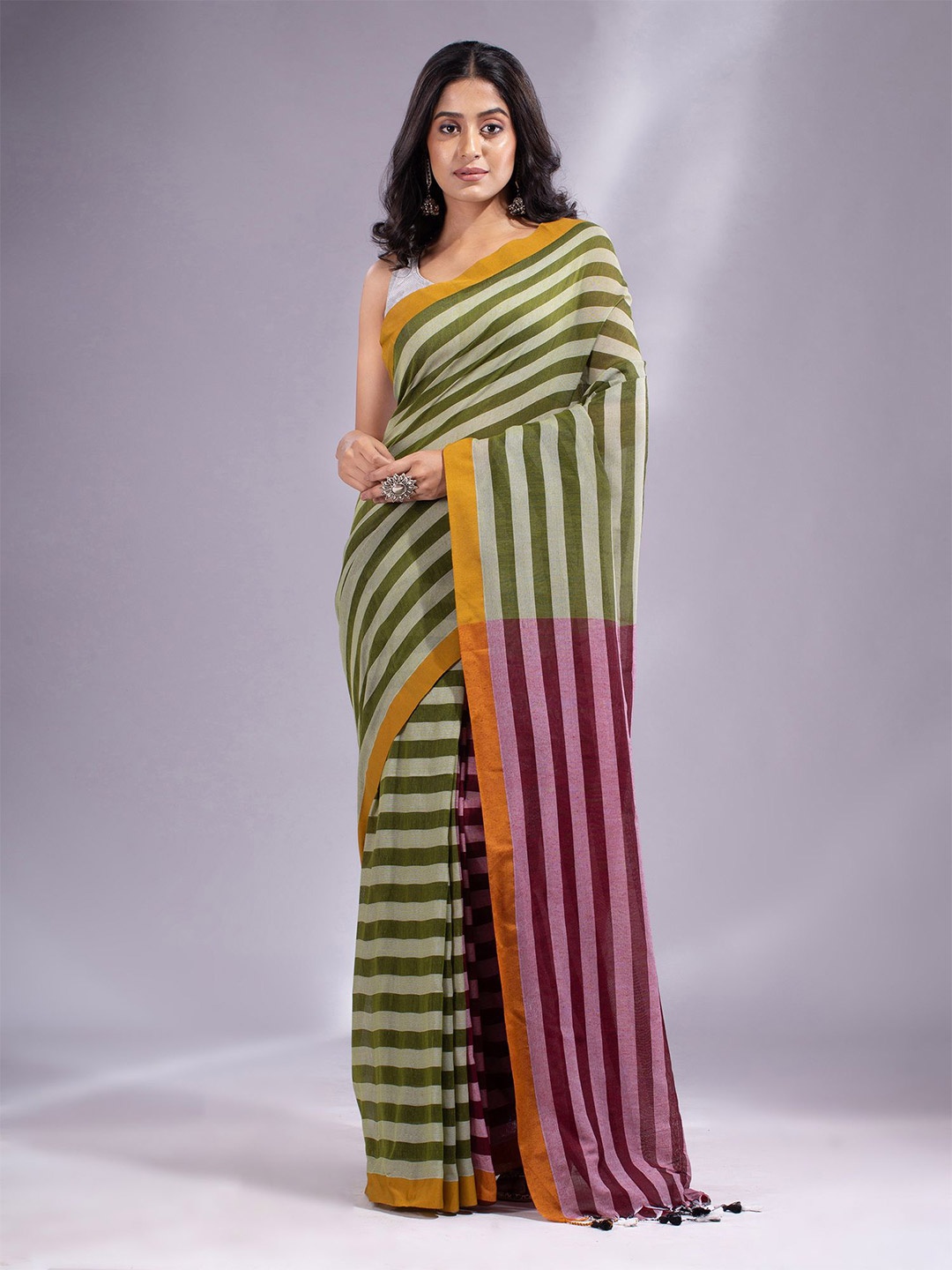 

Charukriti Green & Pink Striped Pure Cotton Saree