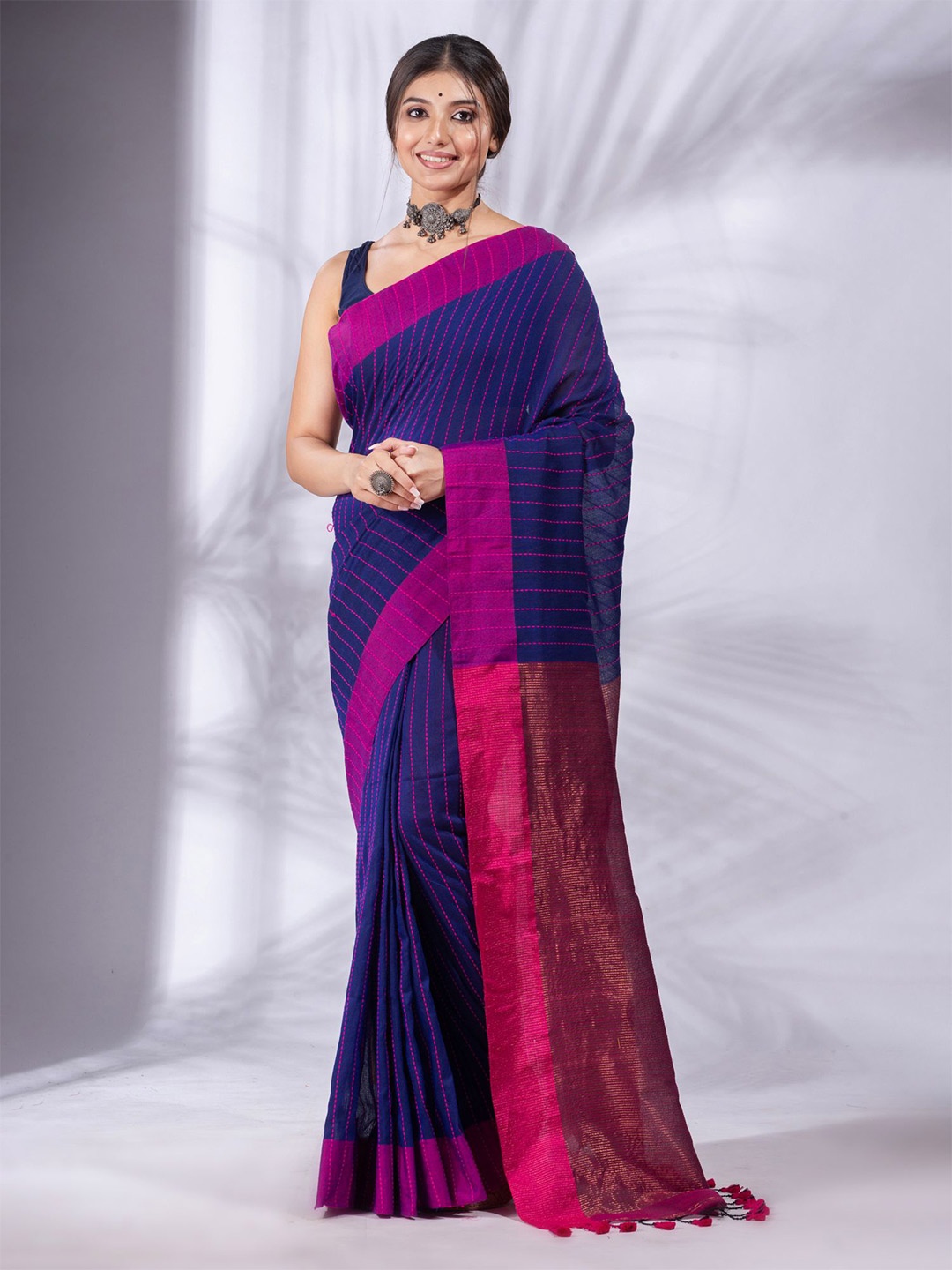 

Charukriti Navy Blue & Pink Striped Pure Cotton Saree