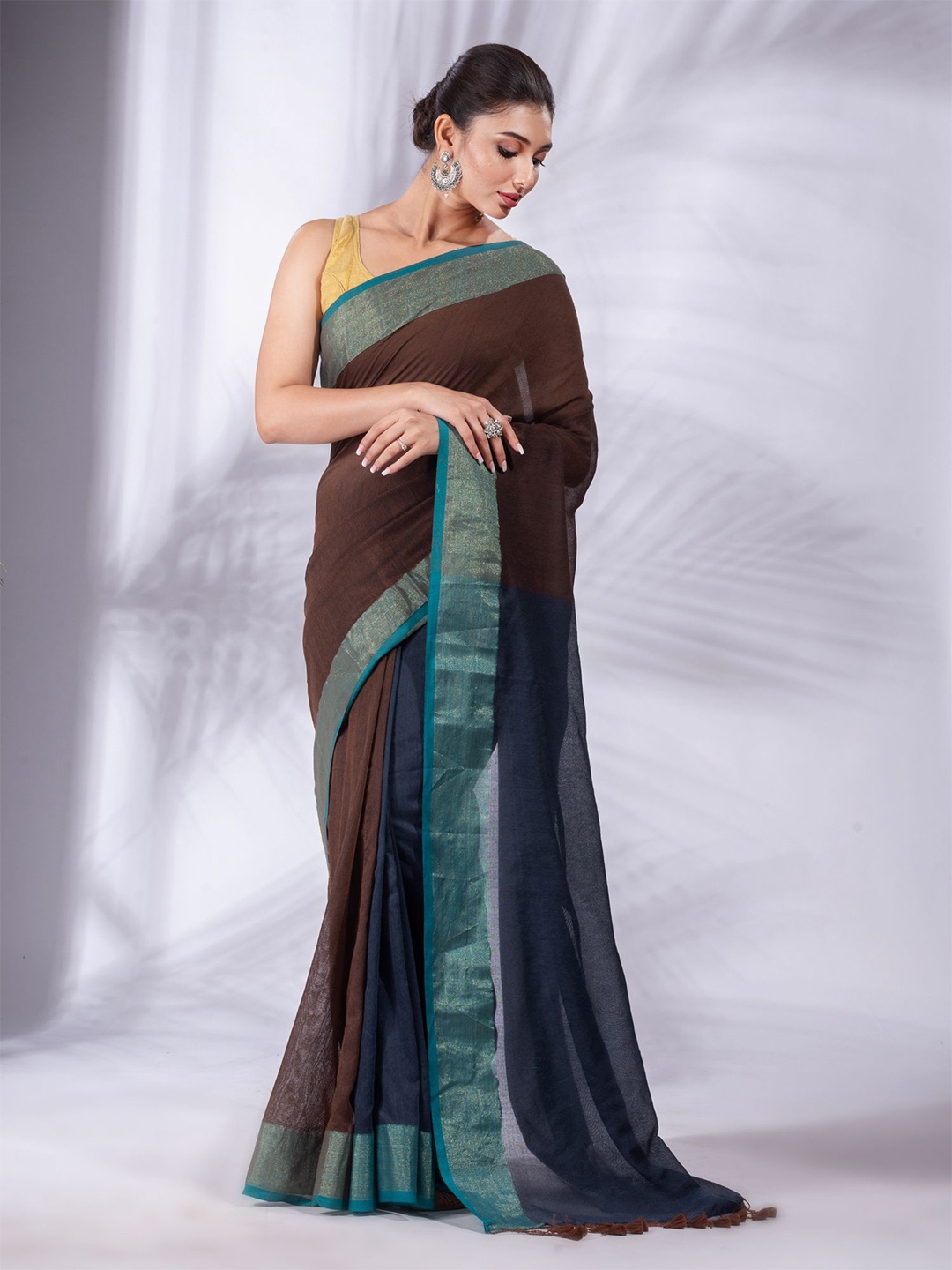 

Charukriti Women Brown & Turquoise Blue Woven Design Pure Cotton Saree