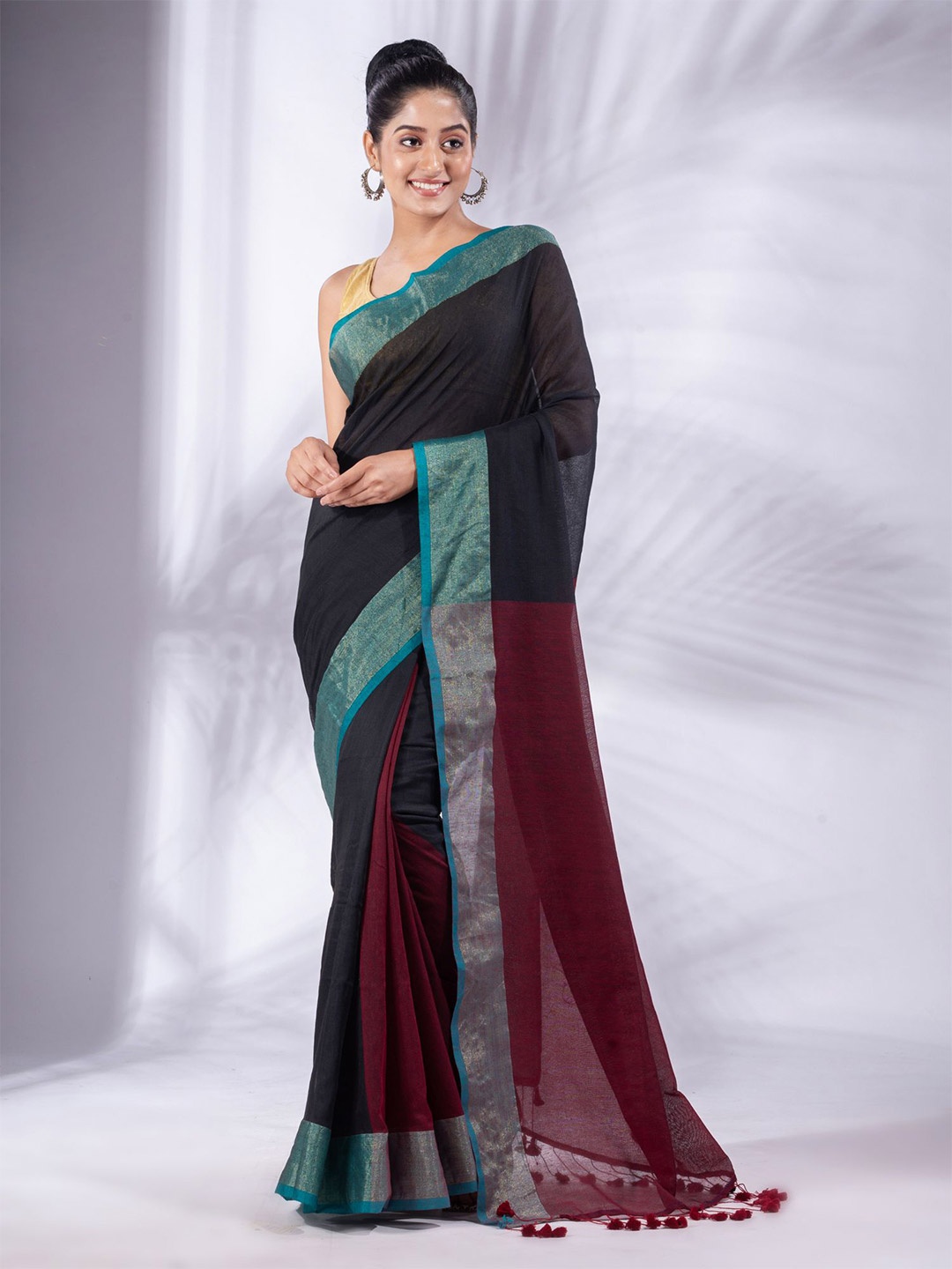 

Charukriti Black & Blue Pure Cotton Saree
