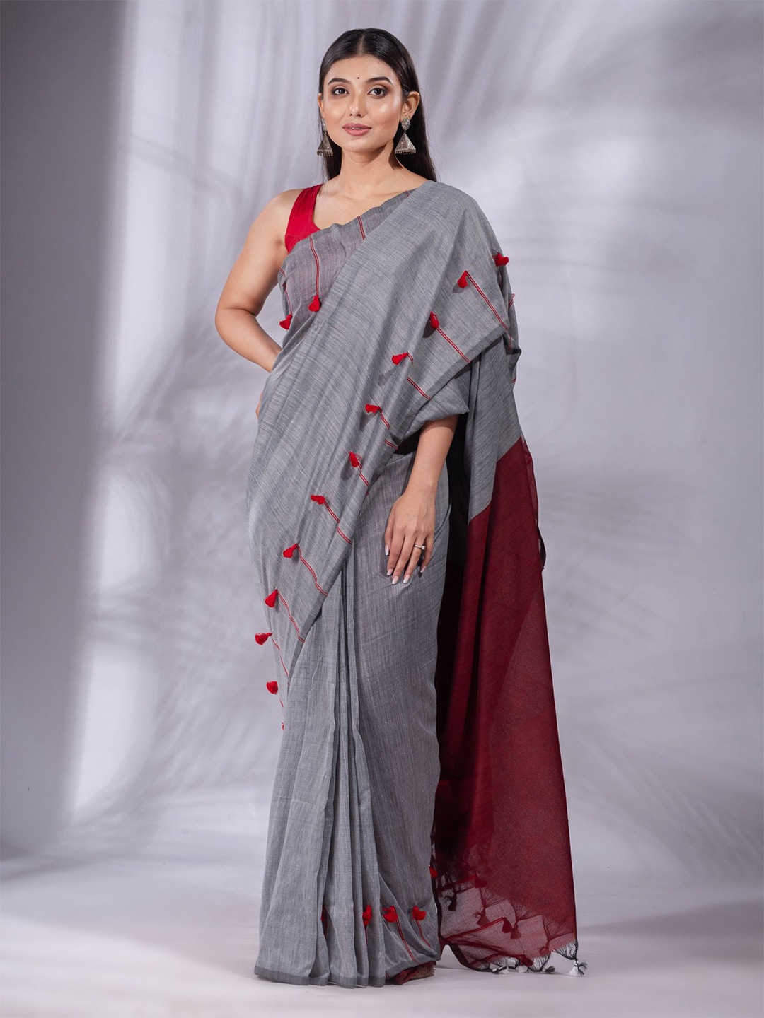 

Charukriti Grey & Maroon Pure Cotton Saree