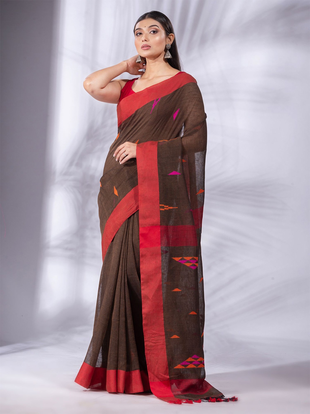 

Charukriti Brown & Coral Woven Design Pure Linen Saree