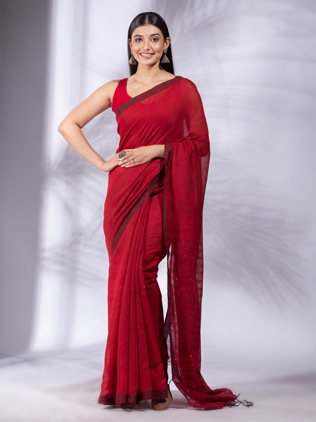 

Charukriti Red Sequined Cotton Blend Saree