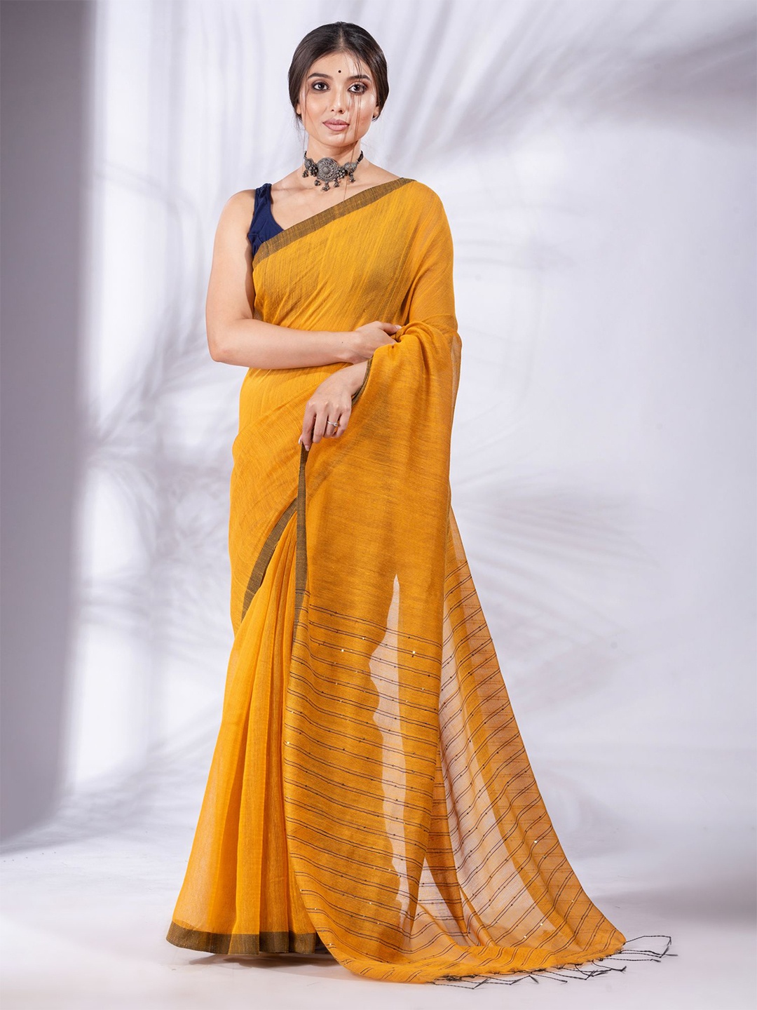 

Charukriti Women Yellow Pure Cotton Saree with sequences pallu