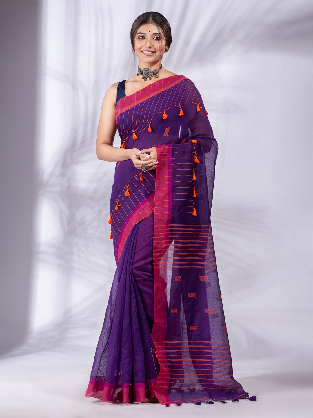 

Charukriti Purple & Pink Woven Design Saree