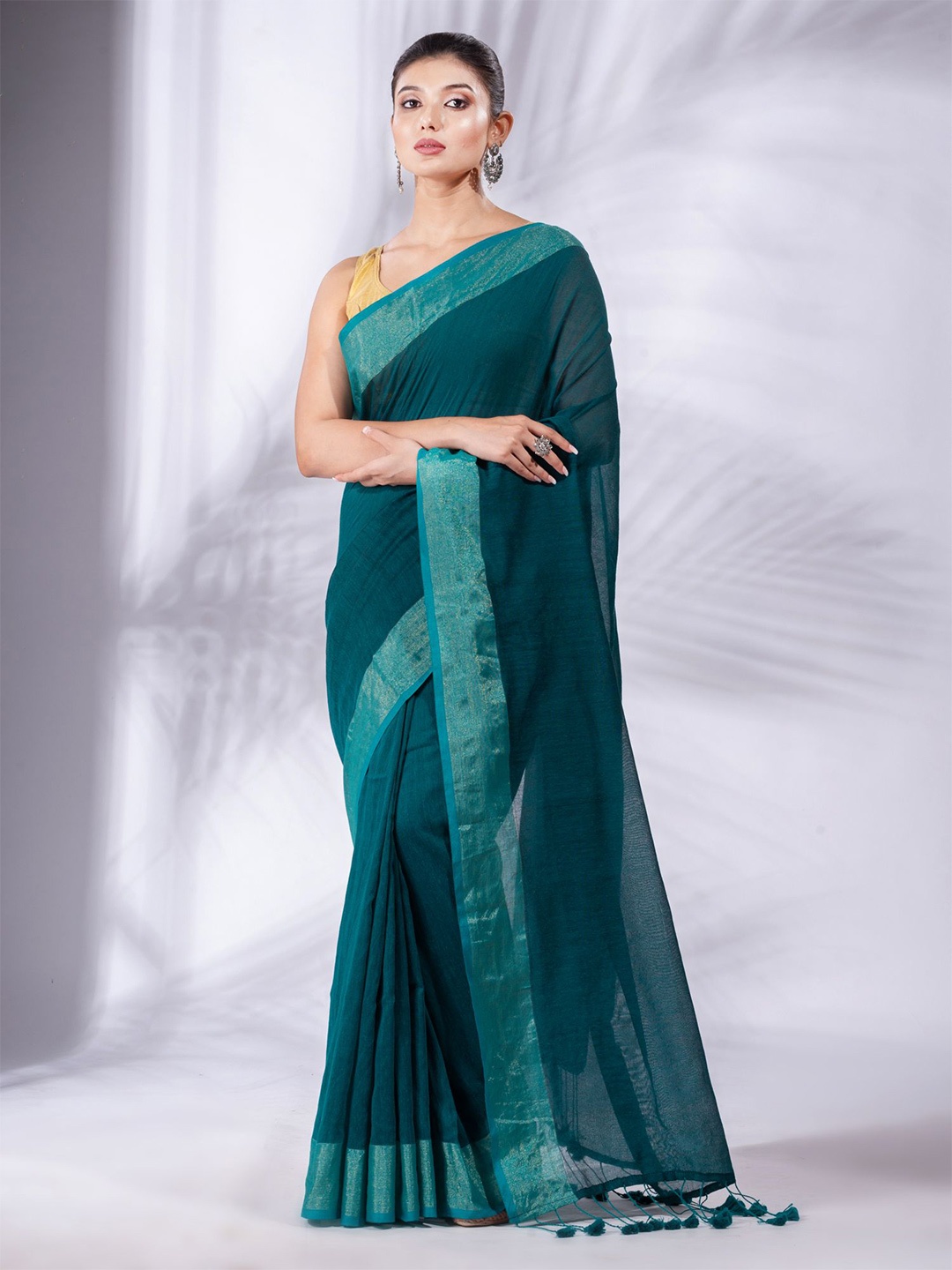 

Charukriti Teal Zari Pure Cotton Saree