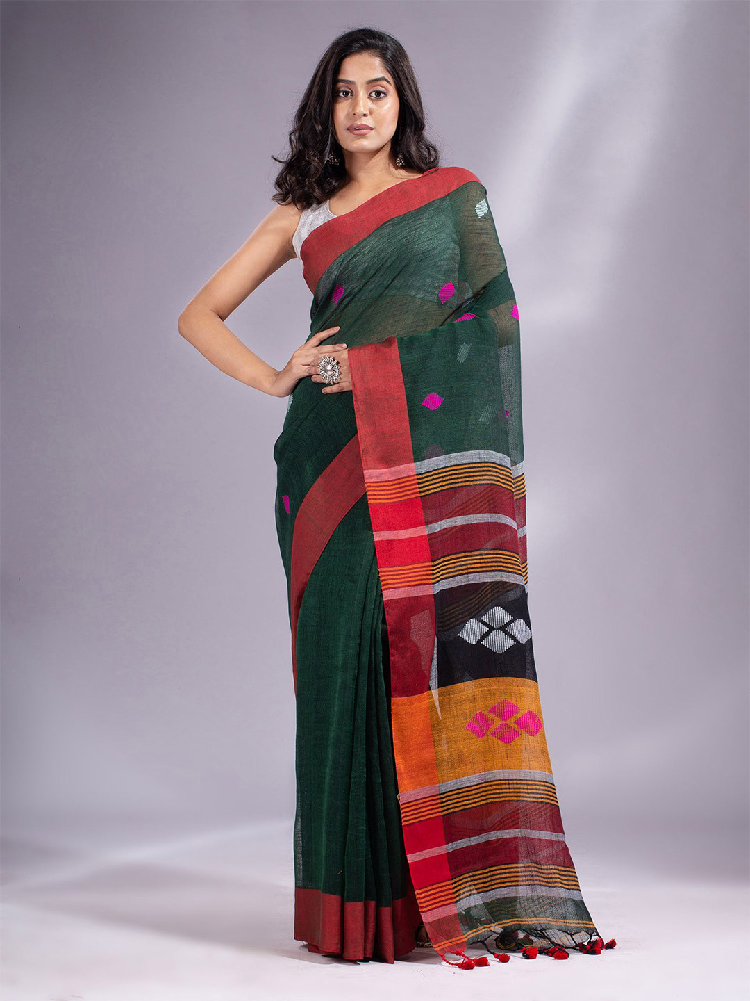 

Charukriti Green & Orange Woven Design Pure Linen Saree