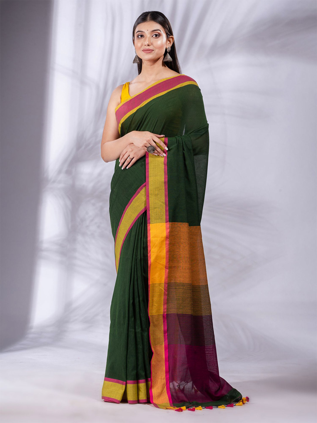 

Charukriti Green & Mustard Solid Pure Cotton Saree