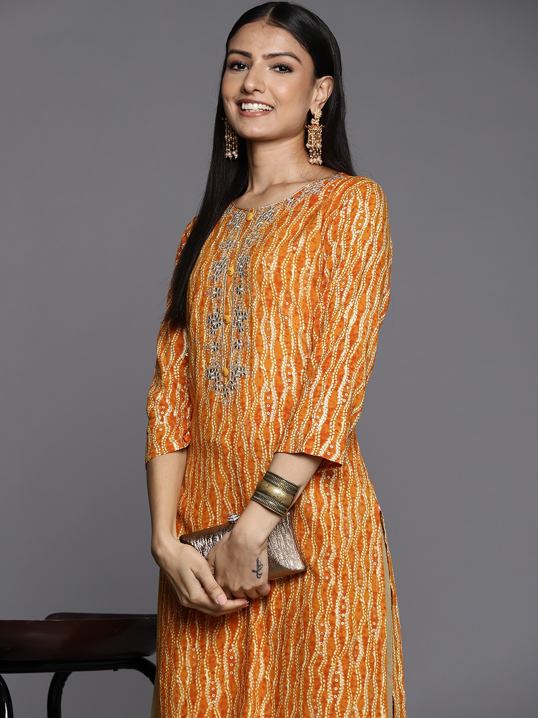 

Varanga Women Mustard Yellow Floral Embroidered Gotta Patti Kurta