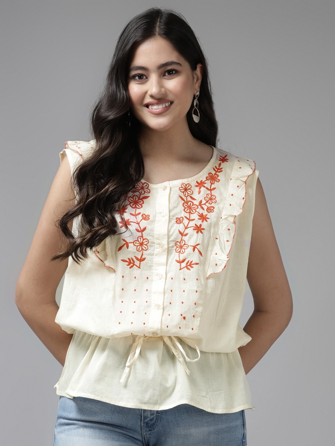

Aarika Cream-Coloured & Orange Floral Embroidered Ruffles Georgette Top