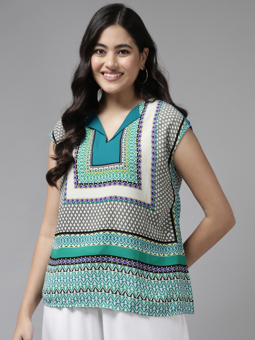 

Aarika Turquoise Blue & White Geometric Print Extended Sleeves Georgette Top